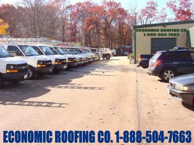 Economic Roofing Office with multiple company vans